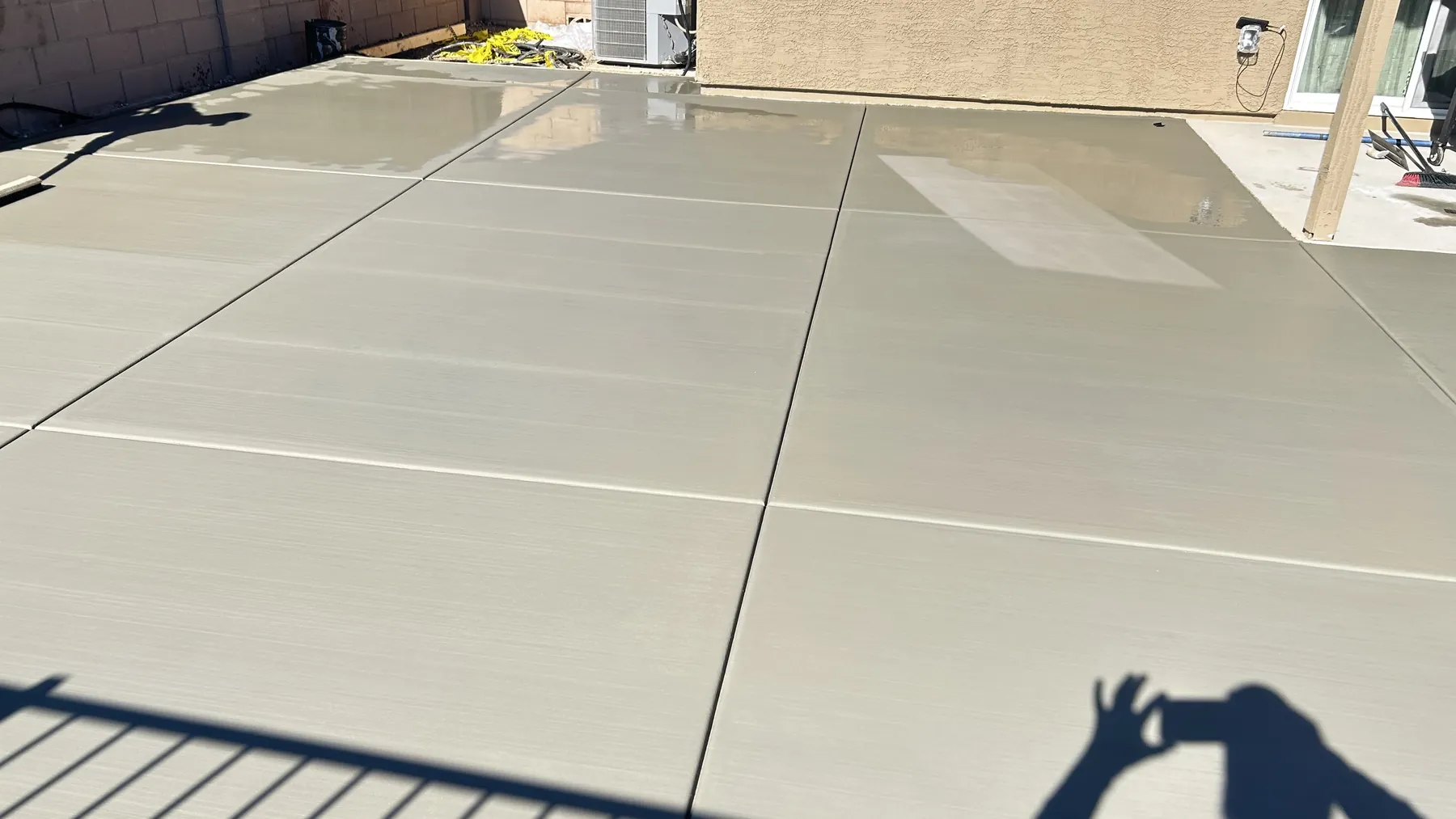 Finished concrete slab in a backyard outdoor space